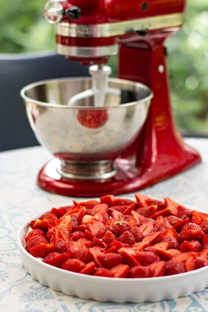 KitchenAid red sliced fruits on stainless steel bowl